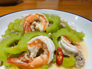 close up picture of bitter gourd salad with prawns.
This is sour and spicy salad Thai style.