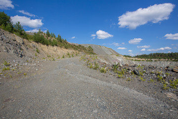 Refuse pile rock heap dump on chromium chrome ore quarry mine 