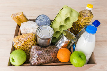 Charity donation box made of cardboard with food