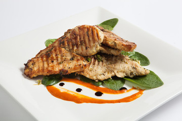 baked chicken with lettuce and orange sauce