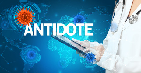 Doctor fills out medical record with ANTIDOTE inscription, virology concept