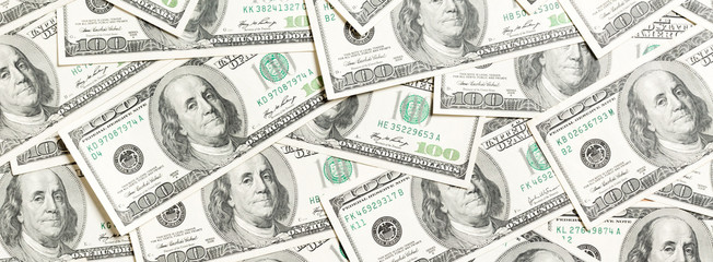 Top view of American money background. Pile of dollar cash. Paper banknotes concept