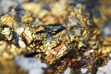 Gold. Yellow nugget. Golden background. Macro