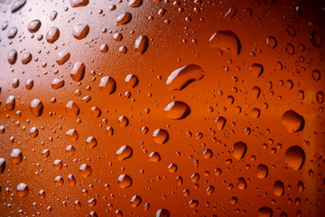 Macro image of cold beer bottle surface condensate effect