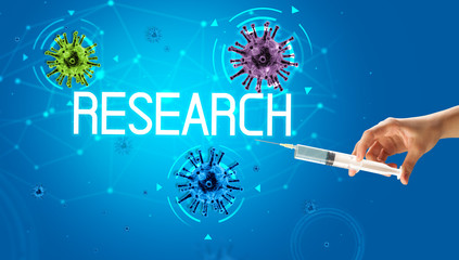 Syringe, medical injection in hand with RESEARCH inscription, coronavirus vaccine concept