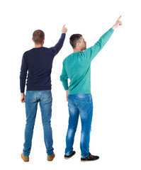 Back view of two man in sweater pointing.