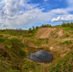 Fototapeta premium Spring landscape of a closed sand pit.