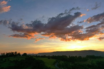 Aerial view of dramatic sky in the ranch. Rural life scene. Countryside landscape. 