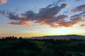 Aerial view of dramatic sky in the ranch. Rural life scene. Countryside landscape. 