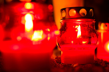 red candles at the night of all saintd days, lampions for the dead