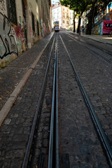Fototapeta na wymiar Tramway rails in a Lisbon street