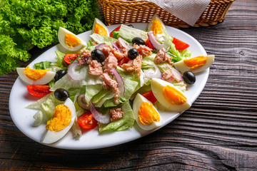 tuna salad on dark wooden rustic background