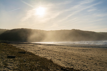 Sun on the beach and mountain