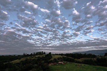 Aerial view of dramatic sky in the ranch. Rural life scene. Countryside landscape. 