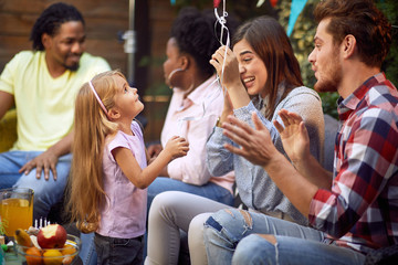Friends and family celebrate birthday.