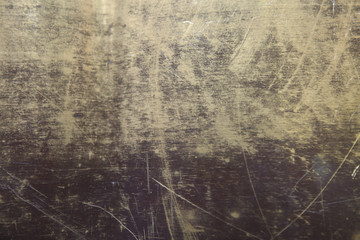 texture of the surface of the brass leaf, in scratches, background