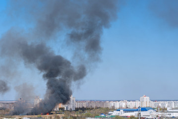 Fototapeta na wymiar View of the city in smoke from a fire