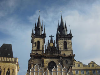 Fototapeta na wymiar Two towers of Church of Our Lady before Tyn, dominant building on Old Town Square in Prague, Czech Republic. Towers are more than 240 feet high. Church is one of tourist attractions in Old Town