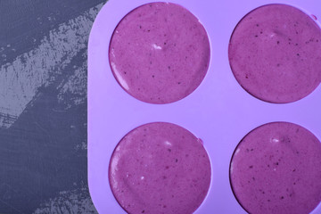 Bilberry mousse in silicone form. process of making a dessert
