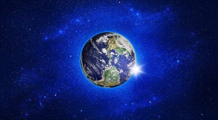 Planet Earth view from space in a star field. Elements of this image are provided by NASA.