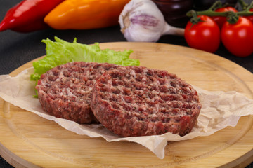 Raw burger cutlet