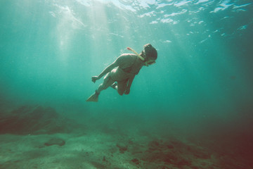 Fototapeta na wymiar bikini girl snorkeling 