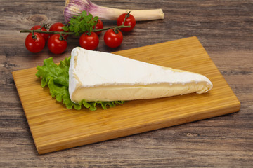 Brie cheese triangle served salad