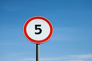 International traffic sign 'Speed limit' (to 5 km per hour). Blue sky is on  background