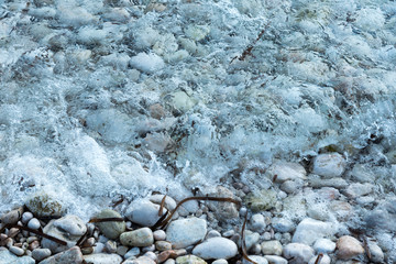 shore with stones close up view