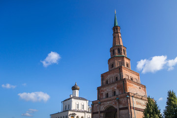 Obraz premium Leaning tower of Soyembika, main recognizable symbol of Kazan, Tatarstan, Russia. This is most attractive object of Kazan Kremlin complex. Height of structure about 58m. Palace church is on left side