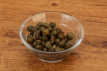 Tasty capers in the bowl