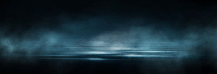 Wet asphalt, reflection of neon lights, a searchlight, smoke. Abstract light in a dark empty street with smoke, smog. Dark background scene of empty street, night view, night city. © MiaStendal