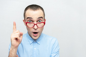 Funny nerd man having a good idea, portrait, white background