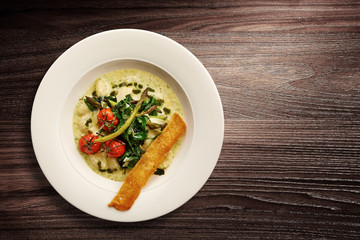 Stylish Nouvelle Cuisine bowl of vegetable cream soup