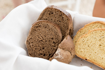 Basket with black and white bread