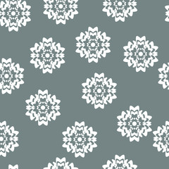 White abstract flowers on a gray background. Snowflakes. Seamless vector texture for wallpaper, packaging, textile, fabric.