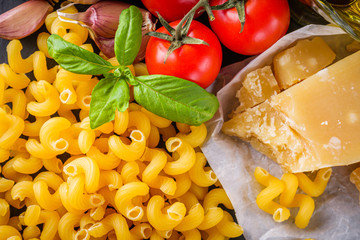 concept of traditional italian pasta with tomatoes and basil