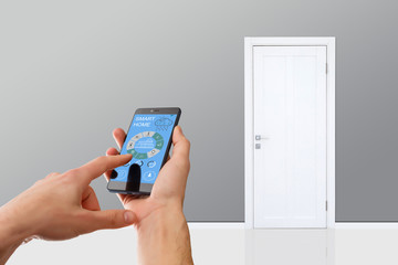 smart house, home automation, device with app icons. Man uses his smartphone with smarthome security app to unlock the door of his house.