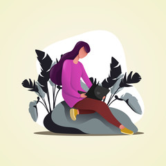 A girl sits alone with her laptop
