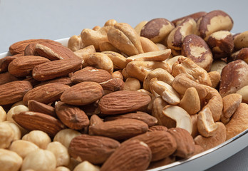 fried cashew nuts and almond background other nuts. Healthy food for health and beauty

