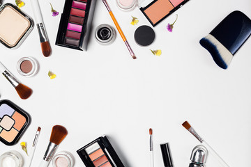 professional decorative cosmetics, makeup tools on white background.