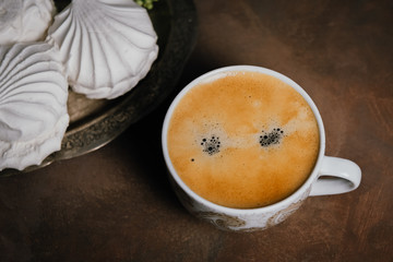 Cup of espresso and marshmallows. Coffee break.