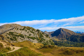 Fototapeta na wymiar Beautiful summer landscape, fantastic alpine pass and high mountains, Dolomites, Italy, Europe. Selective focus.