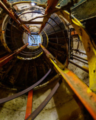 View looking up an old spiral staircase