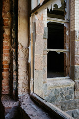 Fototapeta na wymiar old brick destroyed building. Ruined walls and windows