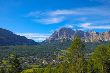 Beautiful summer landscape, fantastic alpine pass and high mountains, Dolomites, Italy, Europe. Selective focus.