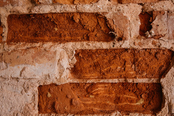Crumbling brick in an old abandoned building