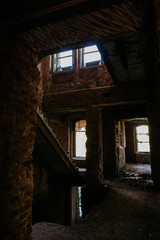Crumbling brick in an old abandoned building