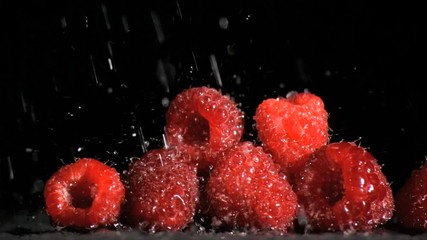 Raspberries in super slow motion being soaked - Powered by Adobe