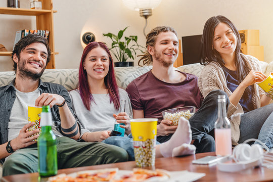 Group of friends enjoying movie time at home